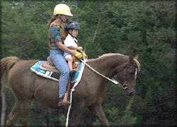 Suzanna Hupp Riding a Horse