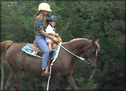 Suzanna Hupp Riding a Horse